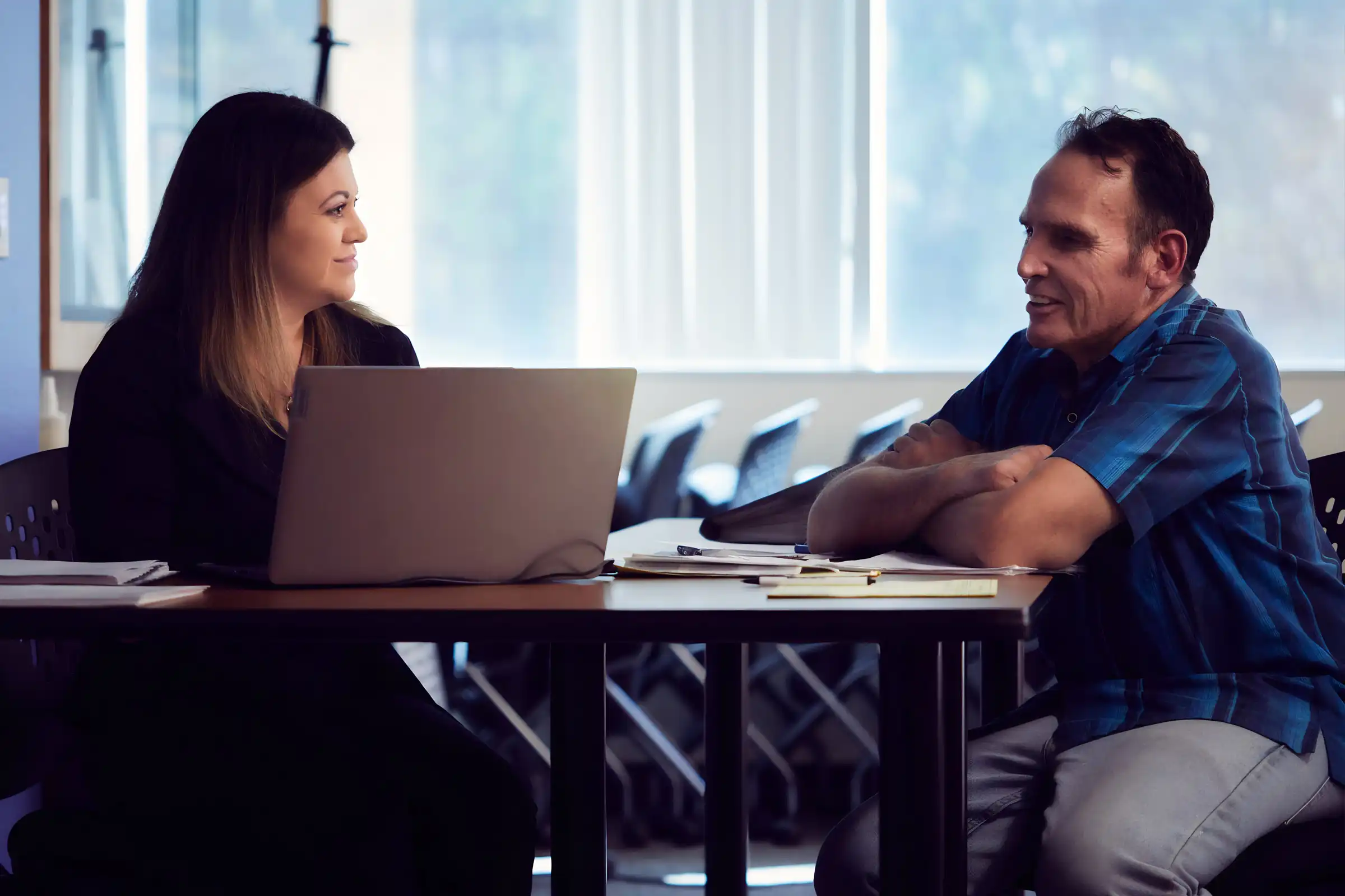 Two people doing taxes.